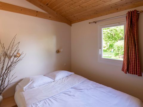 CHALET 4 personnes - Chalet Sapin - 2 chambres - personnes supplémentaires possible en supplément, contacter le camping