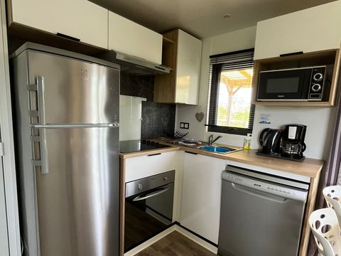 MOBILHOME 4 personnes - Mobil-Home Privilège 2 ch., 2 sdb, 34m² + terrasse 15 m² + climatisation