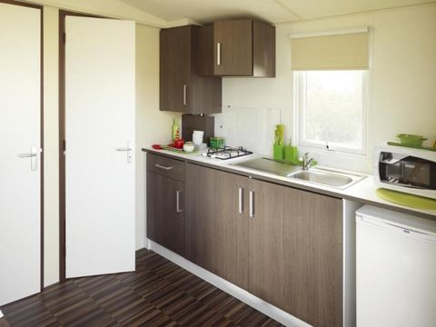MOBILHOME 2 personnes - CLASSIC 18-1  >10ans - maxi 2 adultes - TV, 1 chambre, environ 18m²