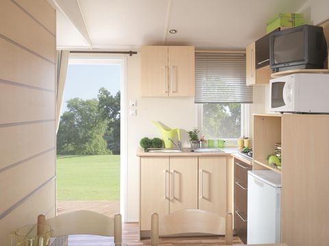 MOBILHOME 4 personnes - CLASSIC 22-2  >10ans - maxi 4 adultes - TV, 2 chambres, environ 22m²