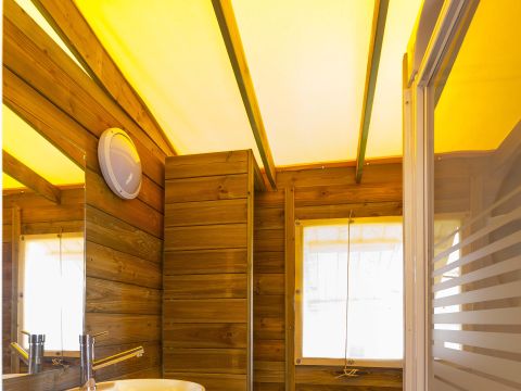 Insolite 5 personnes - INSOLITE 25-2 (Cabane sur pilotis Ecologe) >10ans ; maxi 4 adultes (Lits superposés) TV