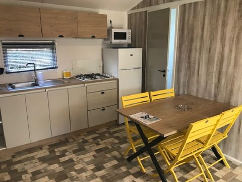 MOBILHOME 4 personnes - Mobil home Confort Nirvana 32m² - 2 chambres - 2 salles de bains + terrasse semi-couverte 15m²