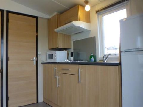 Mobilhome 2 personnes - IRIS- - 1 chambre - Cuisine - Salle de bain - Terrasse couverte
