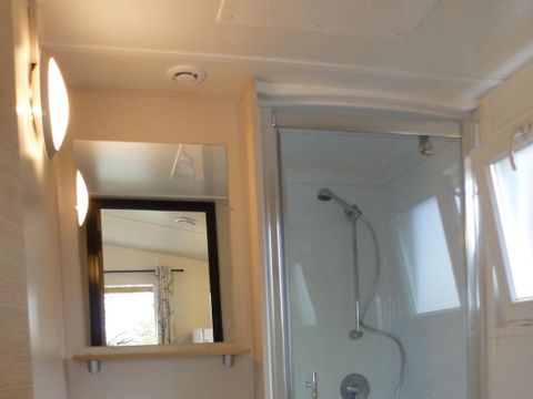 Mobilhome 2 personnes - IRIS- - 1 chambre - Cuisine - Salle de bain - Terrasse couverte