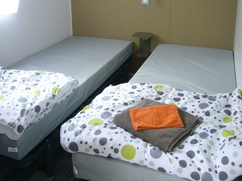 MOBILHOME 4 personnes - CAVALIN Mobil-home Confort 35m² - 2 chambres ( personnes à mobilité réduite) sur parcelle >100m2