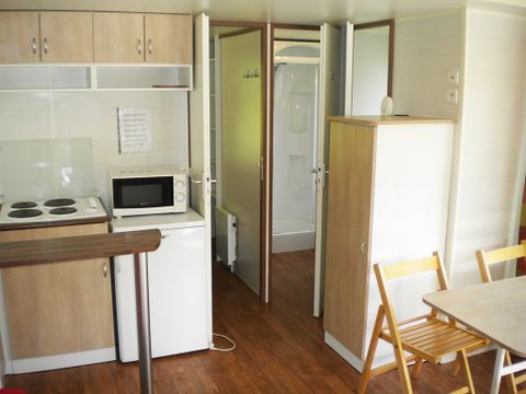 MOBILHOME 4 personnes - Mobil-home Confort 20m² (2 chambres) + TV + Terrasse semi-couverte 16m²