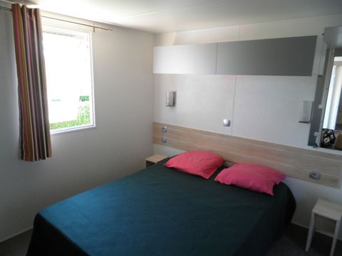MOBILHOME 4 personnes - Standard 32m² - 2 chambres + terrasse non-couverte - PMR