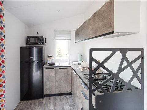 MOBILHOME 4 personnes - "BAHIA Confort +" 27m² - 2 chambres - Terrasse couverte - Lave vaisselle