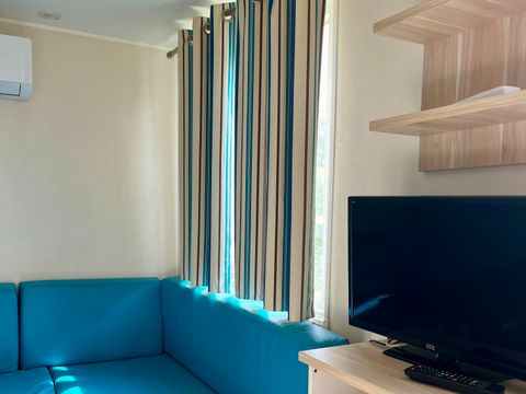 Mobilhome 2 personnes - 15m² - 1 chambre avec 2 lits - Simples - Sans terrasse