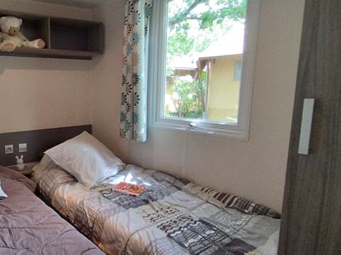 Mobilhome 6 personnes - Standard 29m² - 3 chambres - Terrasse - TV - Clim