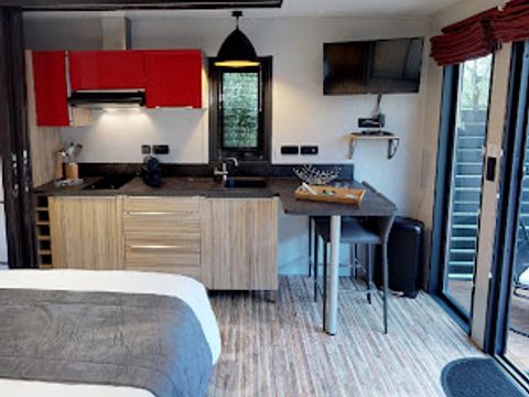 MOBILHOME 2 personnes - Cottage Pagode Premium 2 Pièces 2 Personnes vue lac Jacuzzi + Climatisé + TV