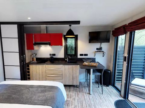 MOBILHOME 2 personnes - Cottage Pagode Premium 2 Pièces 2 Personnes vue lac Jacuzzi + Climatisé + TV