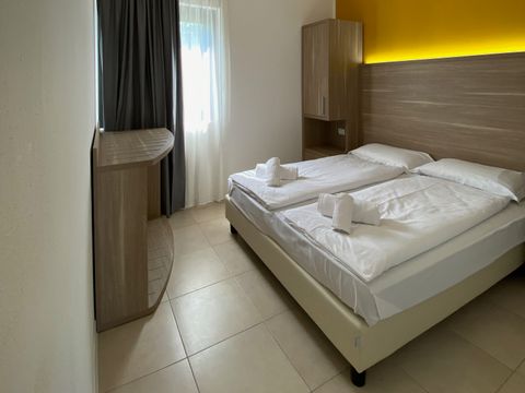 APPARTEMENT 6 personnes - FAMILLE (rez-de-chaussée avec petite terrasse)