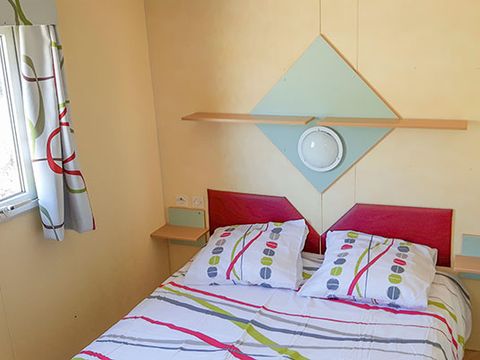 MOBILHOME 4 personnes - Mobil home Confort 2 chambres 28m² + terrasse 9m² + climatisation + TV 4 pers