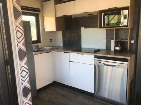 MOBILHOME 4 personnes - Mobil-home Premium 29m² 2 chambres + terrasse 21m² + TV + LV + Clim + plancha 4 pers Mobil-home Premium 29m² 2 chambres + terrasse 21m² + TV + LV + Clim + plancha 4 pers
