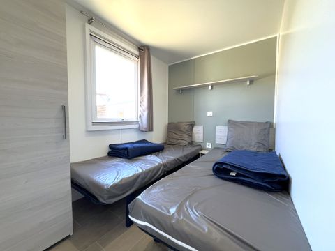 Mobilhome 4 personnes - Homeflower Premium 29 m² 2 chambres + terrasse 17m² + TV + LV + Clim + plancha 4 pers