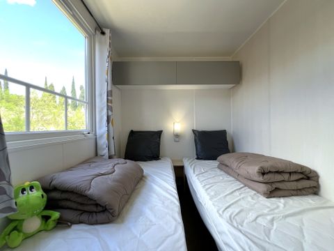 Mobilhome 6 personnes - Standard 32m² (3 chambres) + Terrasse + Clim