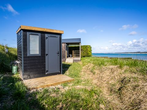 BUNGALOW 4 personnes - Cabane 2 chambres  Vue Mer (avec sanitaires privatifs sur l'emplacement)