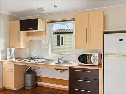 MOBILHOME 4 personnes - PMR | Comfort | 2 Ch. | 4 Pers. | Terrasse surélevée non couverte | Clim.