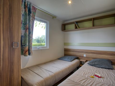 Mobilhome 4/5 personnes - Confort - 2 chambres - Terrasse couverte