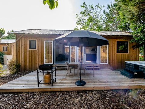 MOBILHOME 4 personnes - Cabane Premium 3 Pièces 4 Personnes Jacuzzi + Climatisé + TV