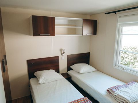 Mobilhome 4 personnes - Confort - terrasse couverte