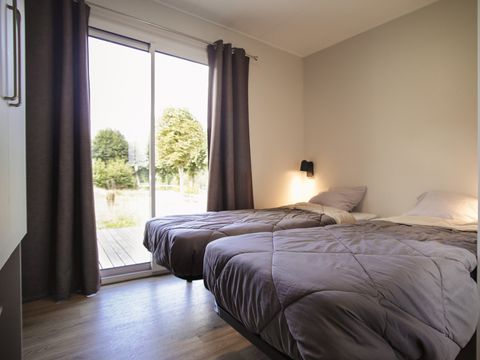Lodge 4 personnes - Serenity 33,9 m² - 2 chambres - 2 salles de bain - Terrasse - TV