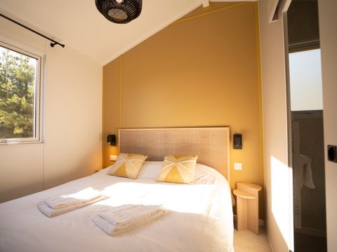 LODGE 4 personnes - Lodge Ethnique (sans spa) 1 chambre + canapé convertible séjour